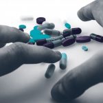 HandsReachingforPills